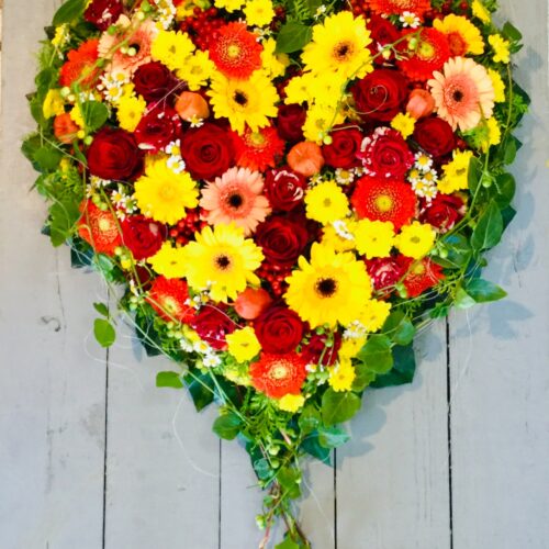 gelb orange Trauergesteck zur Beerdigung